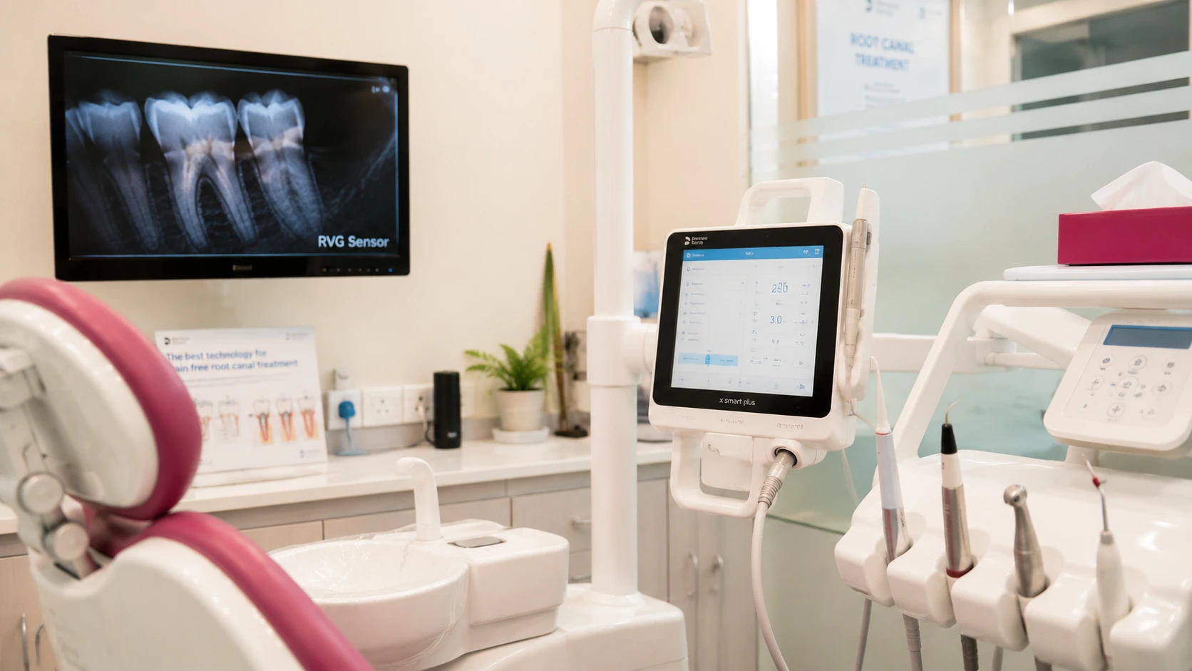 Dentist using modern digital equipment during a comfortable, pain-free root canal procedure